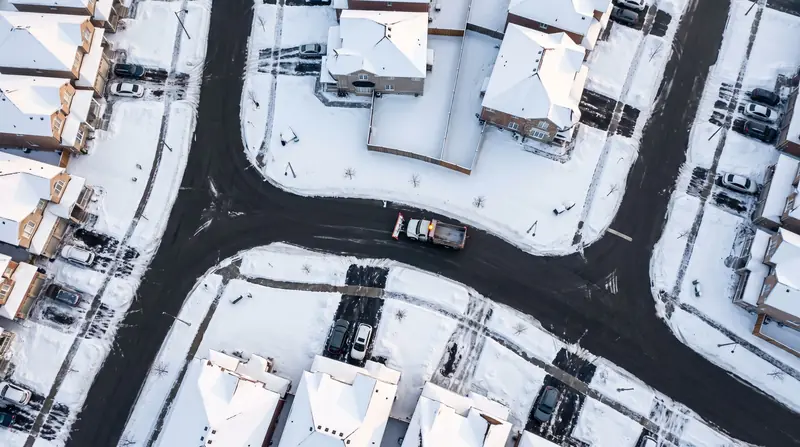 A GTA suburb from the air after a snowstorm, with freshly plowed streets